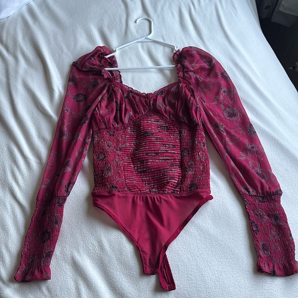 Free people “brunch date bodysuit”